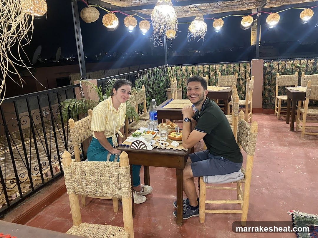 Dining on a rooftop terrace at night