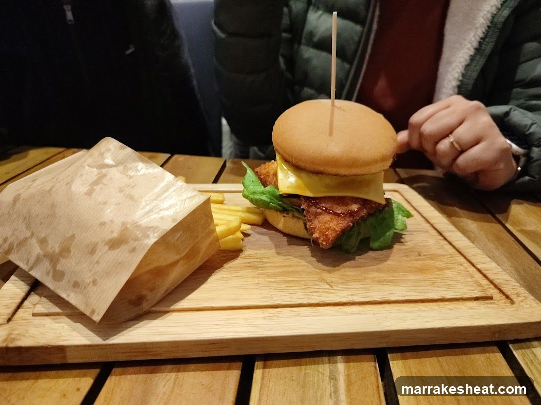 Burger and Fries on Wooden Board